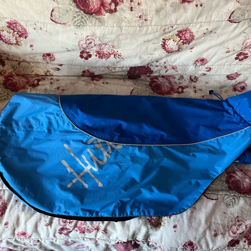 Hurtta dog rain coat.  Blue.  Size 26” length